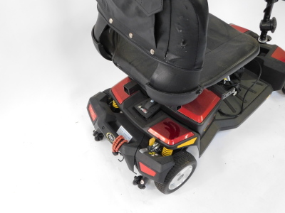 An Apex Rapid 4 wheel mobility scooter, with front basket and charger, in red and black trim. - 3