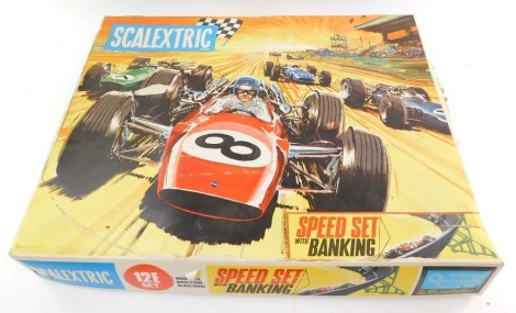 A Scalextric, including cars, track, etc., in a 12E set box.