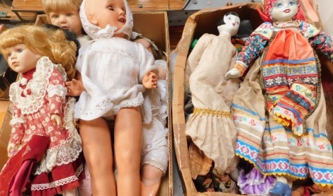 Collector's dolls, some with stands, together with further porcelain dolls, rag dolls, and world dolls. (a quantity)