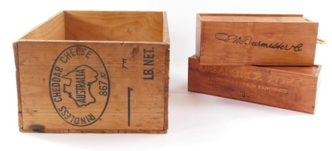 An Australian rindless cheddar cheese crate, 19cm high, 30.5cm wide, 39cm deep, and two port bottle boxes, 52.5cm and 29cm wide. (3)