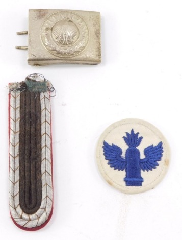 A German buckle, together with cloth badges. (a quantity)