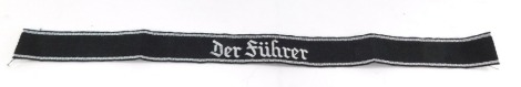 A Der Fuhrer flat wire cuff title, 44cm wide.