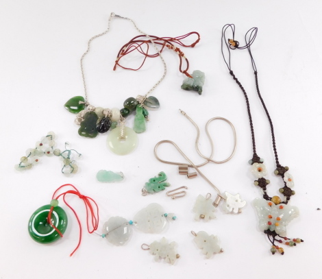 A group of Chinese jade jewellery, including pendants, necklaces and earrings. (a quantity)