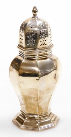 A George V silver sugar caster, of octagonal baluster design, on a stepped base, 16.5cm high, Birmingham 1932, 13oz.