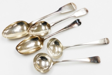 Silver flatware, comprising a William IV Fiddle pattern table spoon, Newcastle 1831, 2oz, a composite pair of sauce ladles, Old English pattern, both initialled 'W', both London 1799, and two other silver spoons, 7½oz all in. (5)