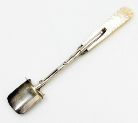 A William IV silver cheese scoop, with patent sliding action and carved mother of pearl handle, Birmingham 1832, maker George Unite, 21cm long.