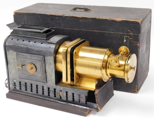 A Helioscopic magic lantern, bearing label for Walker Sylvers, 48 Waterloo Road SE, in an outer wooden case, the lantern 48cm wide, 28cm high.