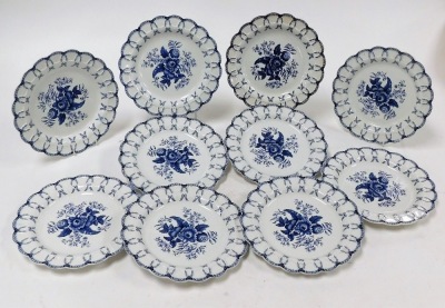 A set of ten Booths blue and white plates, in Worcester style, each with floral fret border and central fruits and flowers design, with B emblem to reverse, 23cm diameter.