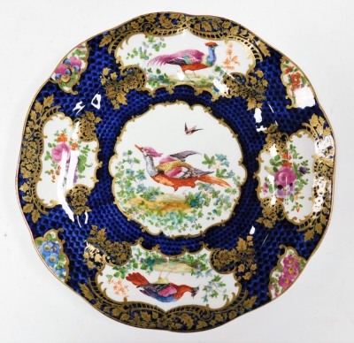 A group of Booths dinner wares, comprising dinner plates with a royal blue ground with gilt detailing with pheasants and posies groups numbered 1127, comprising twenty one dinner plates, eleven side plates, two teacups, nine small plates and five saucers. - 2