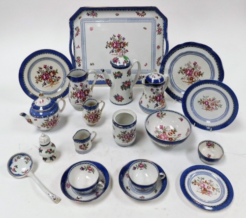 A group Booths Lowestoft border pattern part wares, to include coffee pot, tea cup, milk jug, sugar bowl, teapot, pepper shaker, ladle, graduated plates, serving tray, etc. (AF)