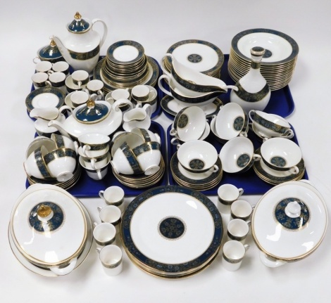 A Royal Doulton Carlyle pattern part tea and dinner service, comprising coffee cans and saucers, large coffee pans, coffee pot, teapot, milk jugs, gravy boats and stands, ladle, tureens, vinaigrette, dinner plates, etc. (a large quantity)