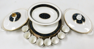 A Royal Doulton Carlyle pattern part tea and dinner service, comprising coffee cans and saucers, large coffee pans, coffee pot, teapot, milk jugs, gravy boats and stands, ladle, tureens, vinaigrette, dinner plates, etc. (a large quantity) - 6