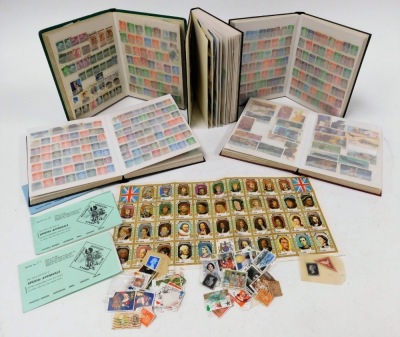 A group of world used stamps, enclosed in five Stanley Gibbons books, to include many from the British Isles, Australia, a Penny Black, a Cape Of Good Hope Triangular One Penny, some postcards, cigarette cards, trade cards, etc. (1 tray)