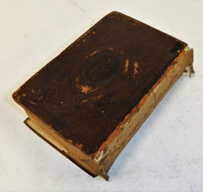 A 19thC leather bound Holy Bible, with inscription dated 1835, with a Christian motto crest to exterior. (AF) - 3