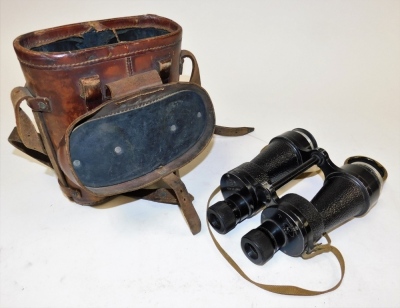 A set of Bino Prism number five mark three military binoculars, each with military arrow dated 1941 registered number 28991, in leather fitted case numbered A9697 1. - 2