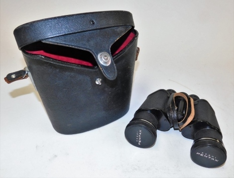 A cased set of Asahi Pentax binoculars, in black leather carry case.