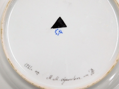 A Russian propaganda plate, dated 1921, with black triangle and blue stamp to reverse, 24cm diameter. - 2