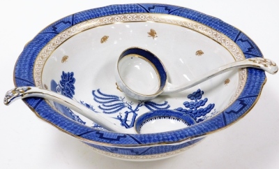 A Booths Real Old Willow pattern large bowl, and two associated ladles, 41cm diameter.