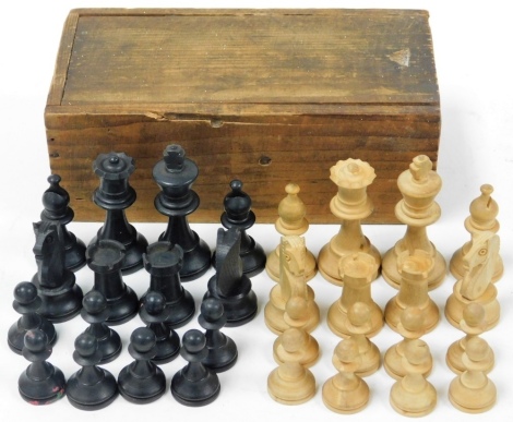 A wooden chess set, unmarked in wooden fitted case.