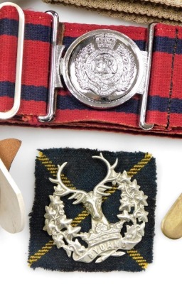 A group of Royal Engineers badges, belts and arm straps, to include a Royal Engineers carry case, belt, Highlands badge, belt, etc. (a quantity) - 2