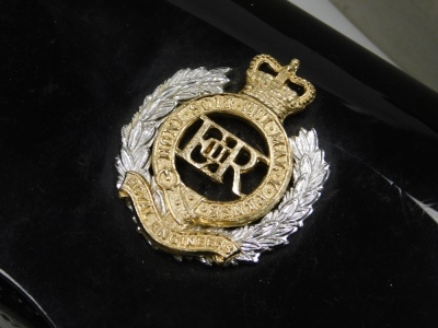 A group of Royal Engineers badges, belts and arm straps, to include a Royal Engineers carry case, belt, Highlands badge, belt, etc. (a quantity) - 4