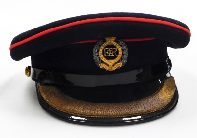 A group of Royal Engineers caps and memorabilia, to include a drum decanter, model of a Royal Engineer, two paperweights, crested badges and three caps. - 5