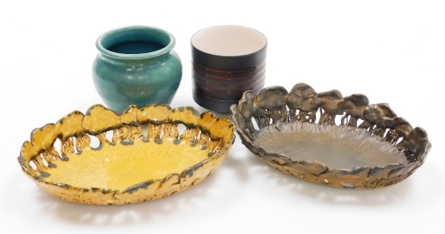 A small group of studio pottery, to include two leaf design bowl one in brown one in tan, each stamped MH 87, 20cm wide, a studio pottery cup, with five lined roof decoration marked KRW 9cm high, and a studio pottery turquoise mottled jar marked MH 82 9cm