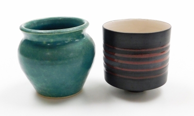 A small group of studio pottery, to include two leaf design bowl one in brown one in tan, each stamped MH 87, 20cm wide, a studio pottery cup, with five lined roof decoration marked KRW 9cm high, and a studio pottery turquoise mottled jar marked MH 82 9cm - 4