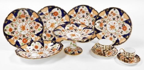 A group of Royal Crown Derby Imari wares, two patterns, comprising tea cup and saucer, and coffee cup and saucer (AF), comport, cake plates and four dinner plates. (a quantity)