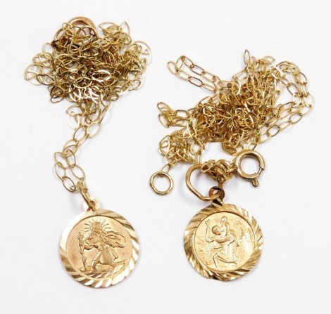 Two 9ct gold St Christopher's pendants, on fine link 9ct gold chains, 1.3g.