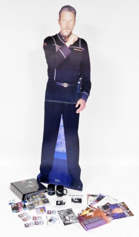 A group of Babylon Five memorabilia, to include a large cardboard cut out, security clearance badges, trading cards, mugs, magazines, etc. (a quantity)