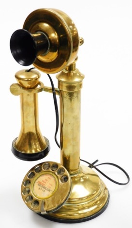 A vintage GEC brass telephone, candlestick model with speaker and receiver, and turn dial for Hounslow 8719, 31cm high.