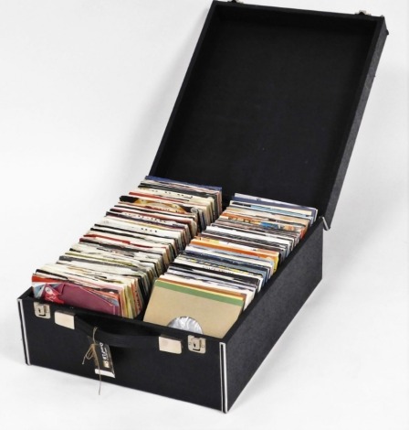 A cased set of 45 rpm records, mixed genres, to include Bucks Fizz, Enigma, John Lennon, Polydor Records, Chariots of Fire, Platinum Pop, Orchestral, Stevie Wonder, Lionel Richie, and others. (1 box)