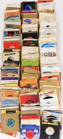 A group of 45rpm LP records, mixed genres, to include artists such as Strangers, The Moon Trekkers, The Cherokees, The Titans, and others. (4 boxes)