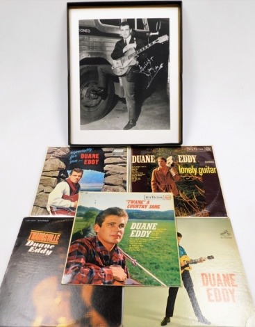 A group of Duane Eddy LP records and music, to include five albums bearing biro signatures, Especially For You Duane Eddy, Twangsville, Twistin and Twangin, Twanger Country Song and Lonely Guitar, together with a Duane Eddy poster (6)