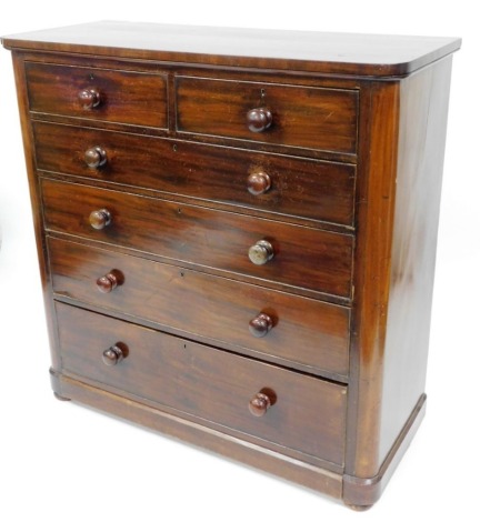 A Victorian mahogany chest of drawers, with two short and four long drawers on canted corners, 120cm high, 120cm wide, 50cm deep.