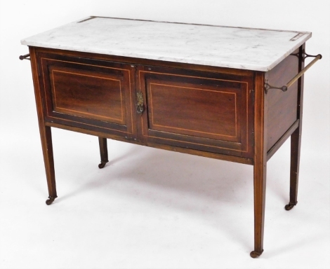 An Edwardian mahogany marble top wash stand, the white marble top above walnut parquetry inlaid base, with brass handles, 79cm high, 108cm wide, 50cm deep.