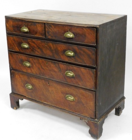 A George III mahogany chest of drawers, with two short and three long drawers with later brass cupped handles on splayed feet, 96cm high, 97cm wide, 51cm deep.