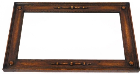 A 1920/30's oak framed rectangular wall mirror, with button and ball detail, 72cm x 45cm.