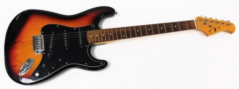 A Brunswick electric guitar, on a wooden body with black panel.