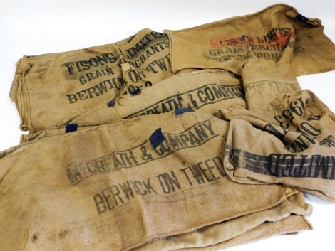 A large group of Hessian advertising sacks.