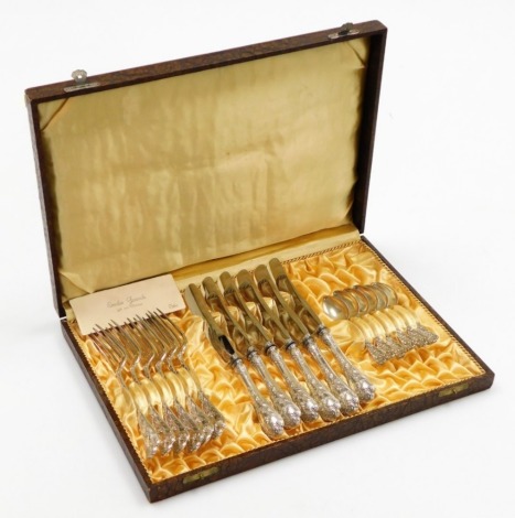 An Emile Franc silver plated dinner set, with six forks, six knives and six teaspoons, each with initials EP and crown emblem, in a fitted case.