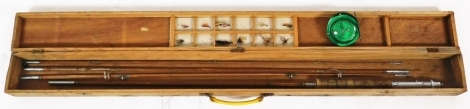 A wooden fishing rod, spool and flies, all in fitted wooden case.