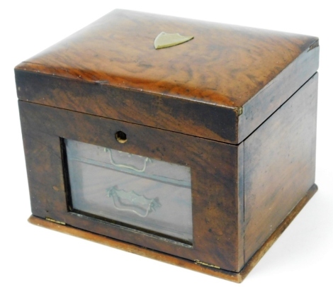 A late 19thC mahogany smoker's cabinet, with plaque inscribed 'Presented To Rose Gowrley by James Pascal Limited Recording Seven Years Service Xmas 1920' with glazed front section opening to reveal two drawers, 18cm high, 24cm wide, 20cm deep.