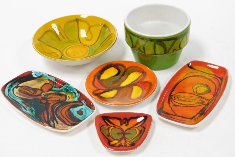 A group of Poole pottery, to include two oval dishes, circular pin dish, green bowl and a fruit bowl. (6)