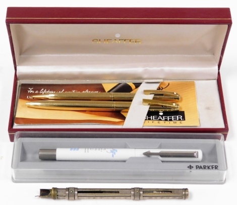 A group of pens, to include a Schaefer two piece pen set, to include pencil and biro in gold coloured finish, a Parker Crittall, and a silver plated and cased fountain pen. (4)