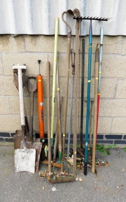 A group of various garden tools, to include rakes, spades, agricultural tools, etc. (a quantity)