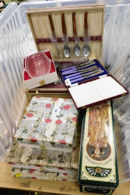 Three cased sets of silver plated cutlery, boxed glassware and a Moet and Chandon champagne tin box, lacking contents.