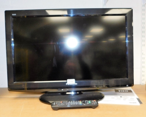 A Panasonic 25" flat screen television with remote control.