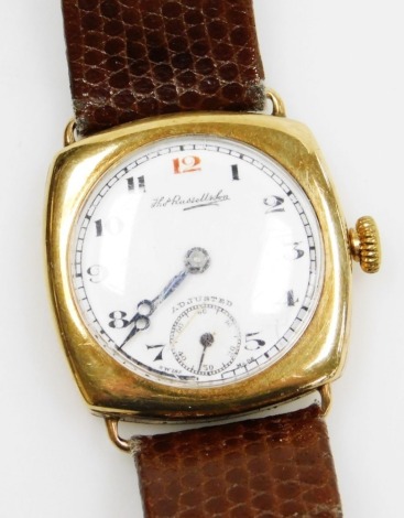 A Thomas Russell & Sons 9ct gold cased gentleman's wristwatch, with circular white ceramic dial, blue hands and seconds dial, on a brown leather strap, the watch head 2.5cm wide, 32.2g all in.